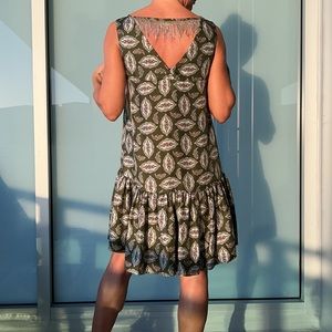 Atelier hand crafted 100% silk dress with elements on the back